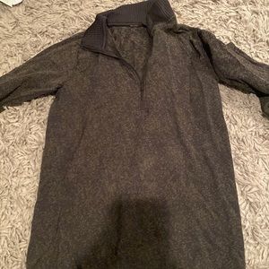 Green lululemon zip up. Very warm and comfortable. No rips or holes at all